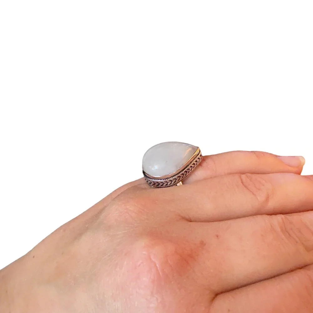 Milky white quartz teardrop stone in sterling silver setting size 6 925